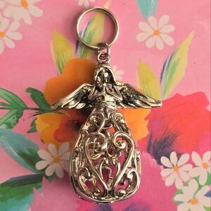 Angel locket pendant silver tone opens cage filigree teardrop angle